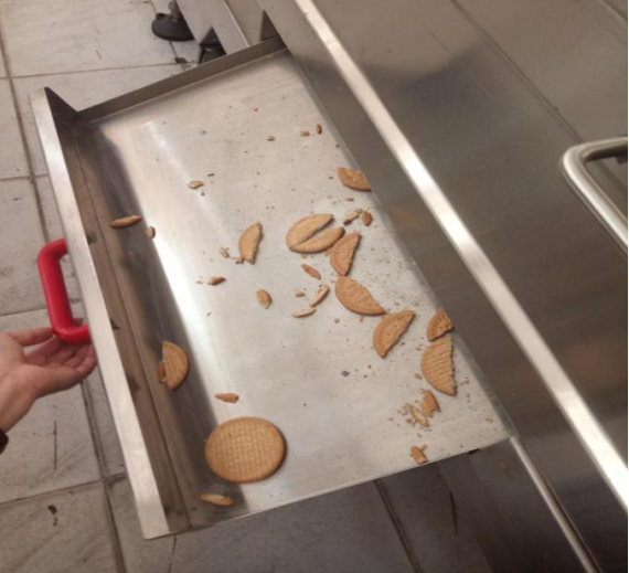 Collecting pans to collect the broken biscuit